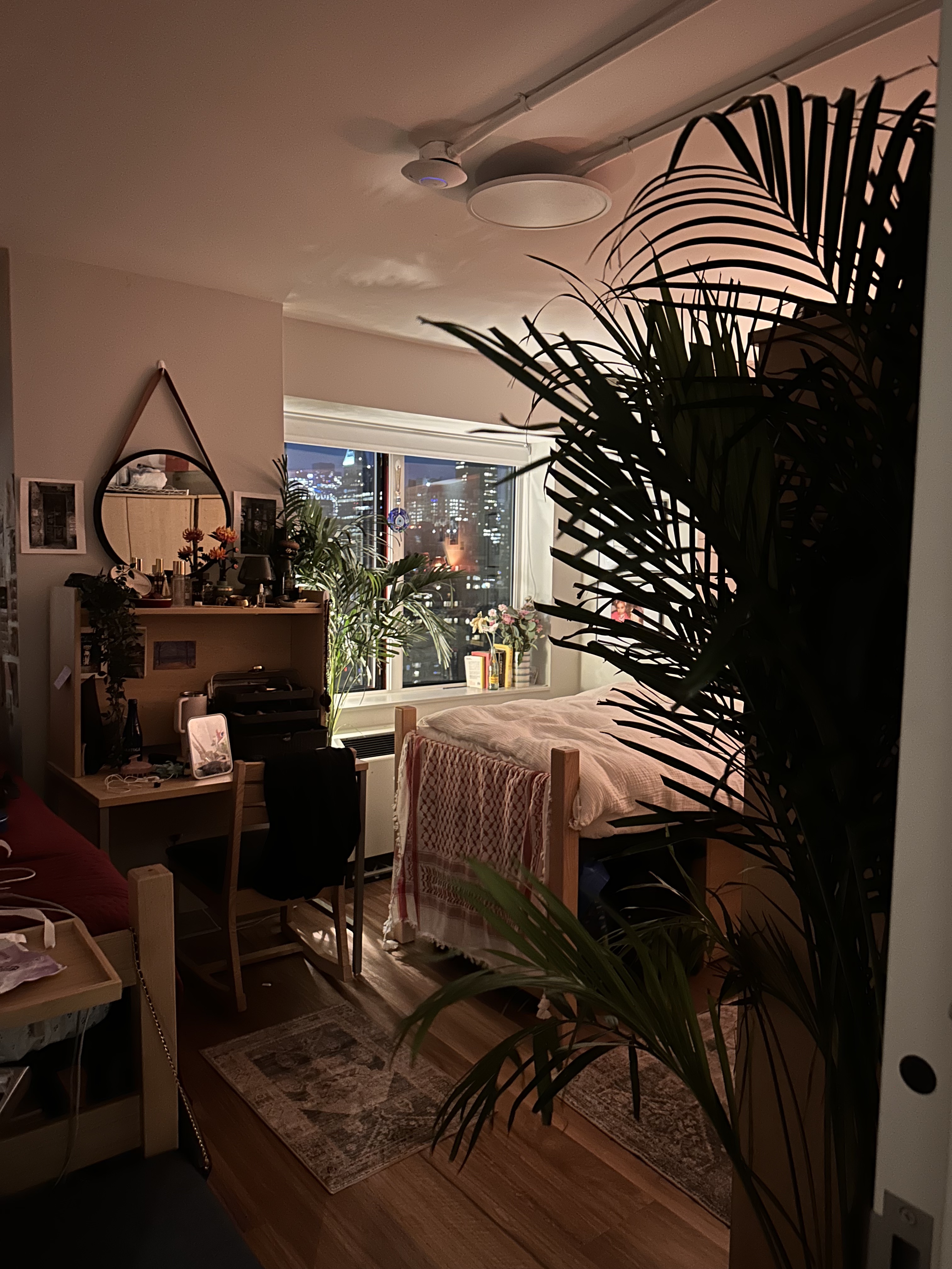 Tall arched Art Deco window with decorative metalwork — London